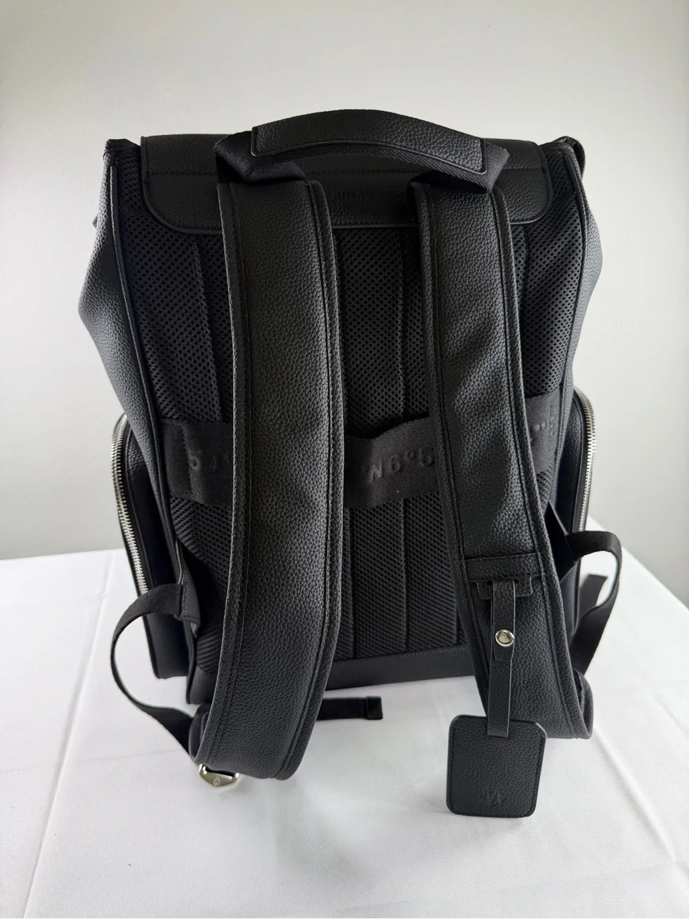 RIMOWA Black Textured Leather Backpack with Blue Zip Accents
